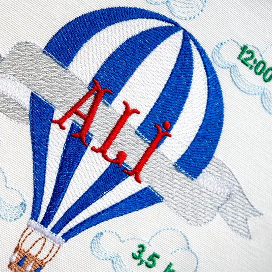 Customized baby boy name hoop with blue hot air balloon embroidery for a newborn gift
