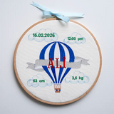 Customized baby boy name hoop with blue hot air balloon embroidery for a newborn gift